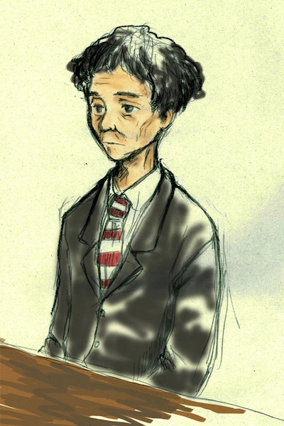 黒のスーツに赤白ボーダーのネクタイ姿で入廷した楳図。その表情はどこか物憂げだった。