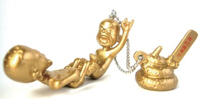 四の字固めフィギュアの金色バージョン。