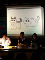 サイバラ画「犬と猫」。「定番キャラですね。ぜんぜん似てないですけどね」とは八巻氏の弁。