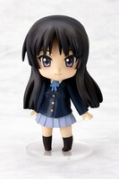 きりっとした表情を見せる澪。(c)かきふらい・芳文社／桜高軽音部