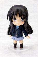 きりっとした表情を見せる澪。(c)かきふらい・芳文社／桜高軽音部