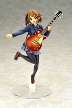 表情もにこやか。(c)かきふらい・芳文社／桜高軽音部