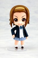 元気はつらつ！な笑顔の律。(c)かきふらい・芳文社／桜高軽音部