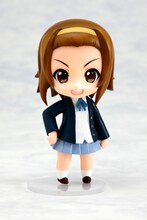 元気はつらつ！な笑顔の律。(c)かきふらい・芳文社／桜高軽音部