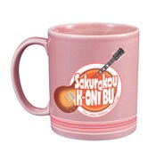 F賞「ビッグマグカップ」唯の裏。(C)かきふらい・芳文社／桜高軽音部