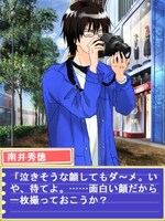 カメラを構える南井秀徳。