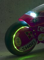 「PROJECT BM！ ポピニカ魂　金田のバイク」の前輪ホイールを発光させた様子。(C)1998 マッシュルーム／アキラ製作委員会