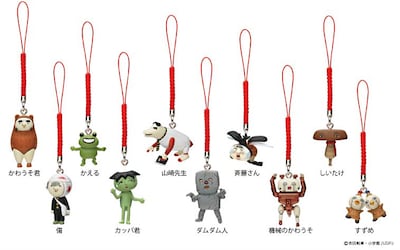 「伝染るんです。フィギュア根付け」全10種類を並べた様子。作品を知らずともビジュアルのみで、かなりシュールな世界観を醸しだしている。(C)吉田戦車・小学館/UDPJ