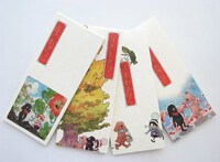 「朝日イベントプラス」で販売されるオチビサン一筆箋セット。左から夏、秋、冬、春。1800円。