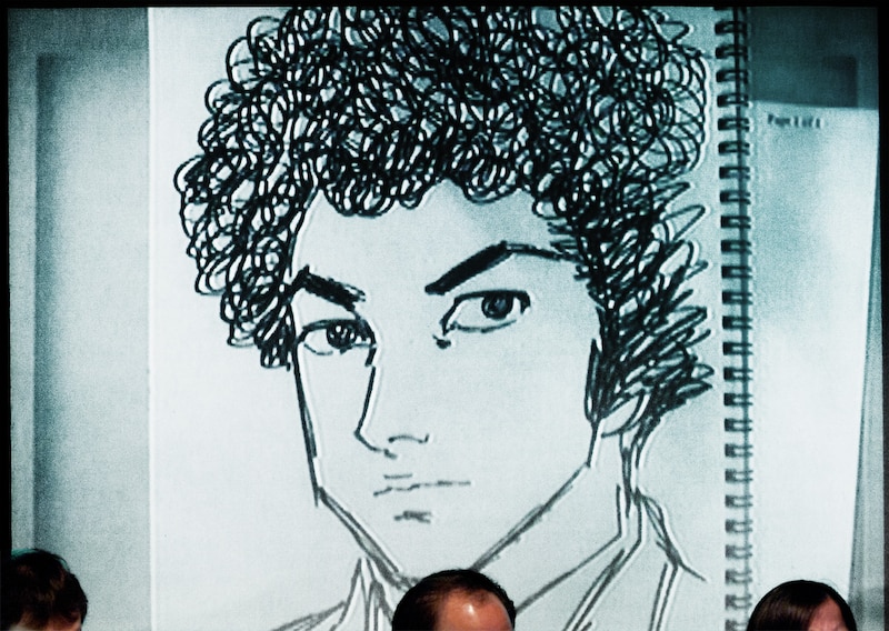 かざま鋭二が描いた、パンチパーマの「島耕作」。パンチパーマは鉄板ネタとして、この後に出てくるお題でも多用された。