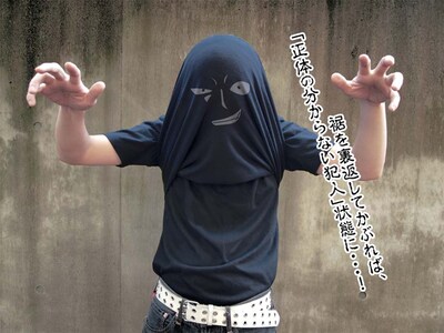 「黒ずくめの組織Tシャツ」使用例。(C)青山剛昌／小学館・読売テレビ・TMS 1996