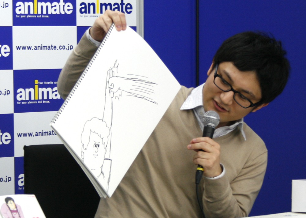 顔の手前でないと、やはりカッコよくないという例。