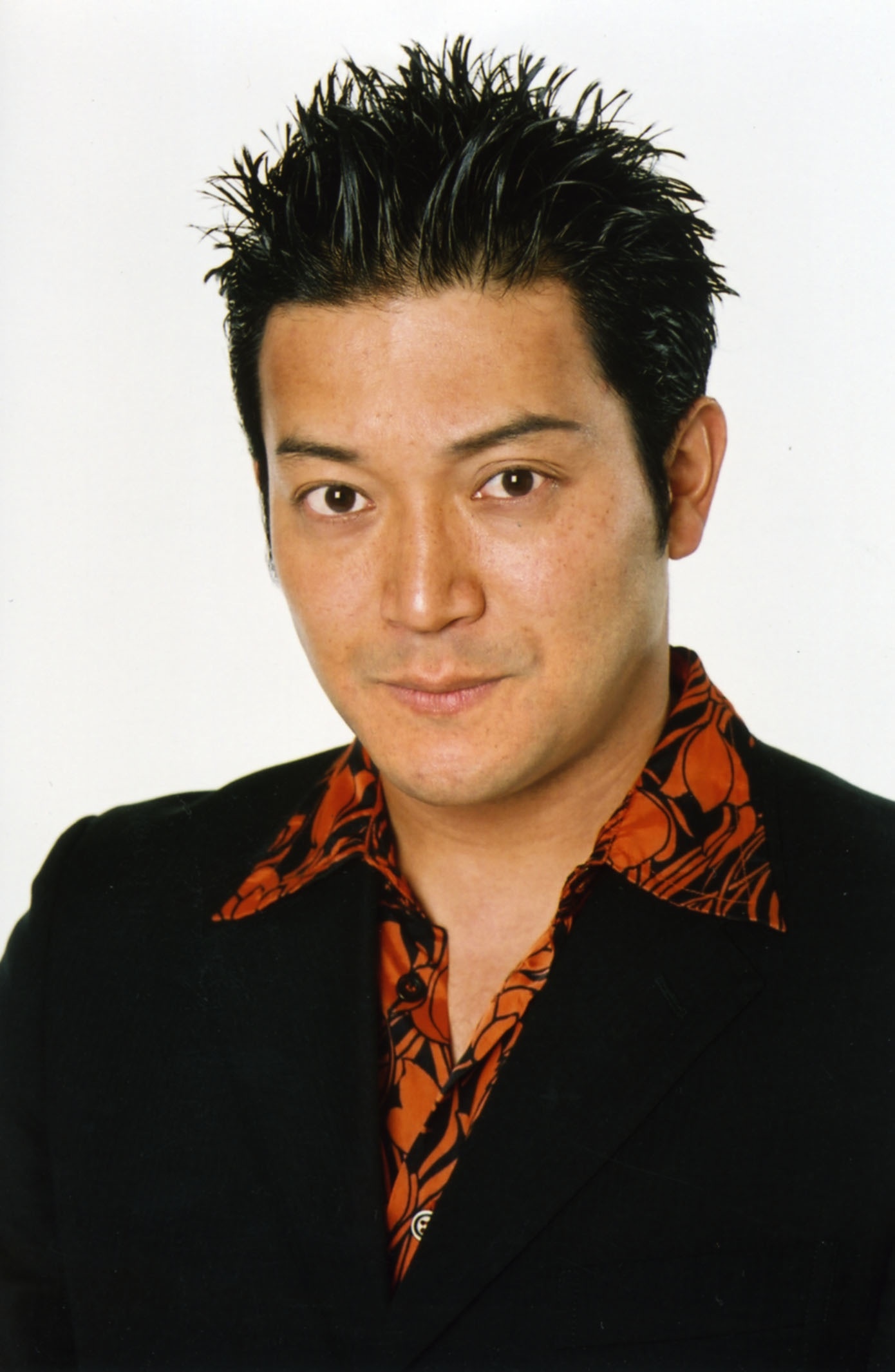 山崎潔史役の山口智充。