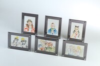 出品される6枚の生原画。裏面には落札者の名前も入れられる。
