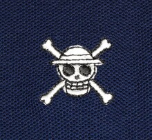 ルフィをイメージした「ONE PIECE FOOTBALL LINEポロシャツ」のネイビー。(C)尾田栄一郎／集英社・フジテレビ・東映アニメーション