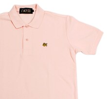 ナミをイメージした「ONE PIECE FOOTBALL LINEポロシャツ」のピンク。(C)尾田栄一郎／集英社・フジテレビ・東映アニメーション