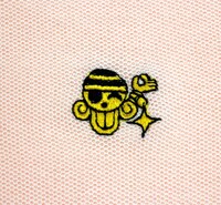 ナミをイメージした「ONE PIECE FOOTBALL LINEポロシャツ」のピンク。(C)尾田栄一郎／集英社・フジテレビ・東映アニメーション