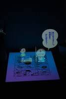 原稿が出来上がるまでの工程を紹介する立体映像。ドラえもんやのび太が紙の上を駆けまわり、原稿を仕上げていく。(c)Fujiko-Pro