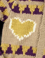 「“ LOVE & PEACE ” Cowichan sweater」Beige (C)Hirohiko Araki & LUCKY LAND COMMUNICATIONS / SHUEISHA