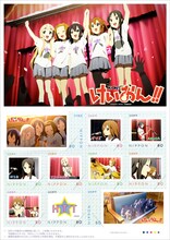 「けいおん!!（アニメ版）」の切手デザイン」。(C)かきふらい・芳文社/桜高軽音部