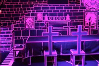 「ドクトル・ホグバックの食卓」。漆黒の室内にホロウが飛び交う。