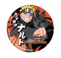 ガラポン屋台オリジナル景品の缶バッジ。(C)岸本斉史　スコット／集英社・テレビ東京・ぴえろ (C)劇場版NARUTO製作委員会 2012