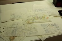 プレゼントされる生原画には、それぞれさまざまなキャラクターが描かれている。