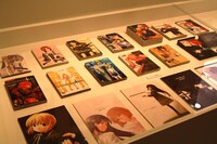 相田裕「GUNSLINGER GIRL」の海外版の単行本と、作品の出発点となった同人誌。
