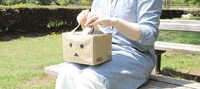 「ダンボーのカートンバッグ」の使用例。(C)KIYOHIKO AZUMA / YOTUBA SUTAZIO