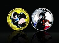 「ブラック・ジャック」連載40周年記念の金貨、銀貨。(c)Tezuka Productions