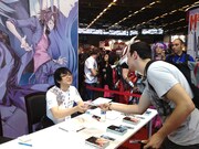 「JAPAN EXPO 2013」にて池野雅博がサイン会を行う様子。