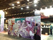 2m×5mにも及ぶ「マリシャスコード」の巨大パネルと池野。