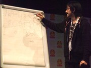 講演会を行う池野。