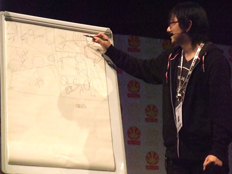 講演会を行う池野。