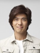 佐藤浩市。「ブラック・ジャック」連載の立役者である鬼編集長・壁村耐三役を演じる。