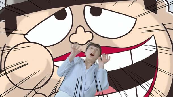 「ドーン！」の決めポーズを取る喪黒福造。(c)藤子(A)・シンエイ・中央公論新社