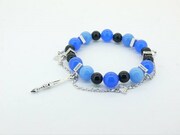 プレゼントのブレスレット「鉄扇簪数珠ブレス（てっせんかんざしじゅずブレス）」。コミックゼノンのオンラインストアでも購入できる。