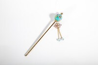 プレゼントのかんざし「菊桜玉一本簪（きくさくらだまいっぽんかんざし）」。コミックゼノンのオンラインストアでも購入できる。