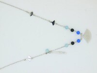 プレゼントのネックレス「鉄扇簪首飾（てっせんかんざしペンダント）」。コミックゼノンのオンラインストアでも購入できる。