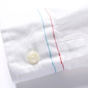 「劇場版 魔法少女まどか☆マギカ［新編］ 叛逆の物語 ボタンダウンシャツ『杏子＆さやかVer.』」。(c)Magica Quartet／Aniplex・Madoka Movie Project Rebellion