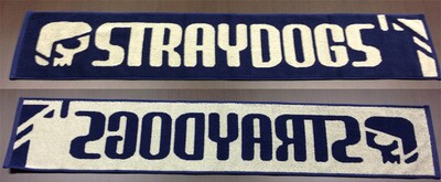 「少女ファイト」11巻特装版に付く「黒曜谷高校ストレイドッグス公式タオルマフラー」。