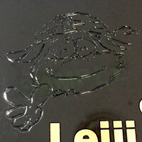 「松本零士公式ファンクラブ」会員証に刻まれた松本零士の自画像。