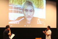 初日イベントの様子。ツイ・ハーク監督はテレビ電話で登場した。