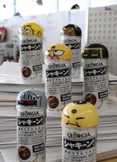 超人の「キャラ缶カップ」が付いた「ジョージア シャキーン！」のパッケージ。