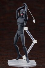 ゴルフクラブを振りかぶる「figma 犯人」。 (c)青山剛昌／小学館・読売テレビ・TMS 1996