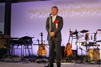 「世界サイレントマンガ オーディション」代表を務める、コアミックスの堀江信彦。