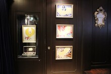 「手塚治虫遺伝子解析プロジェクト」発表会の会場には手塚治虫のイラストや、生前に残した言葉などが飾られていた。