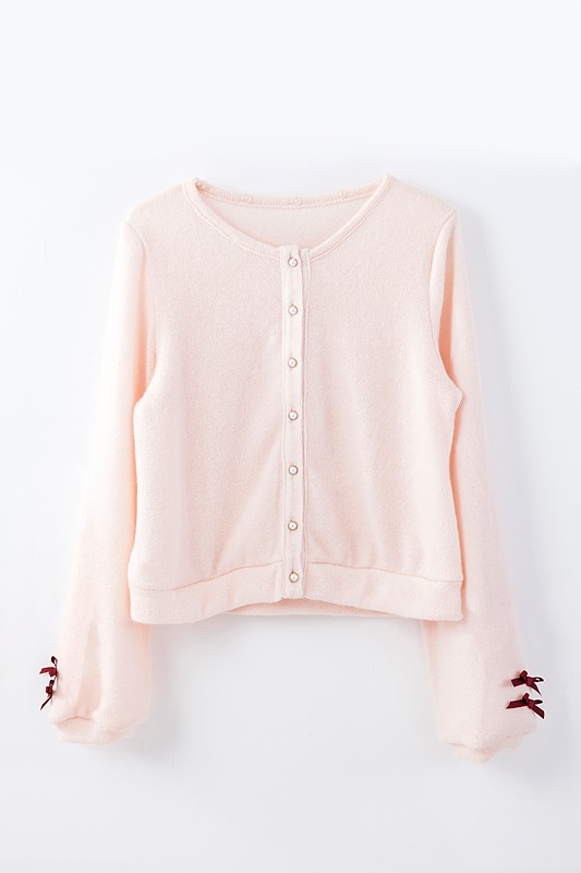 「襟付きカーディガン」のピンク。