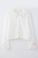 「襟付きカーディガン」のホワイト。