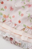 「トップス＆ジャンパースカートセット」のピンクベージュ。